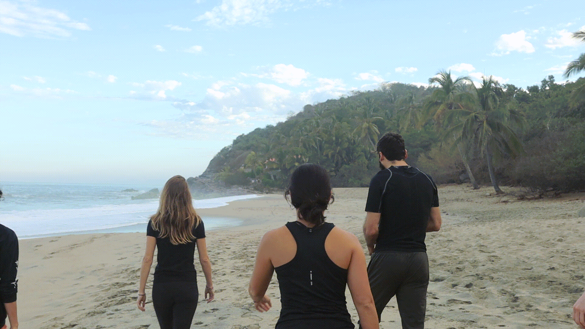 Photo of El Refugio team on the beach